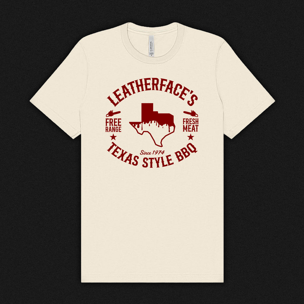 Beige t-shirt with red 'Leatherface's Texas Style BBQ' graphic on a natural color tees